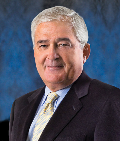 A professional headshot of Louis V. Gerstner, Jr. 