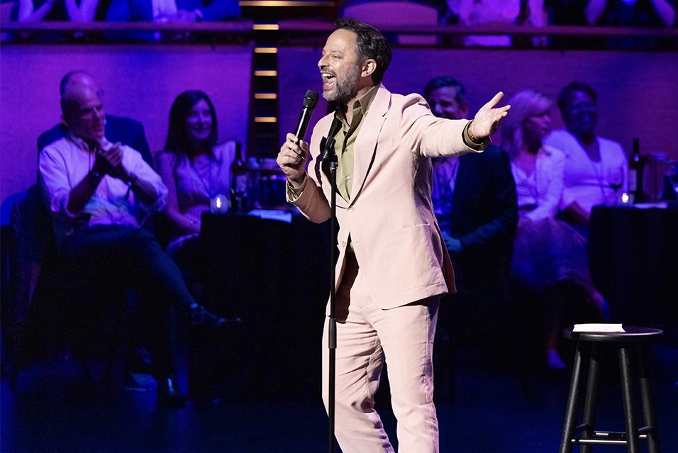 Comedian and co-founder of Comedy vs Cancer Nick Kroll onstage at the New York City theater Jazz at Lincoln Center.  