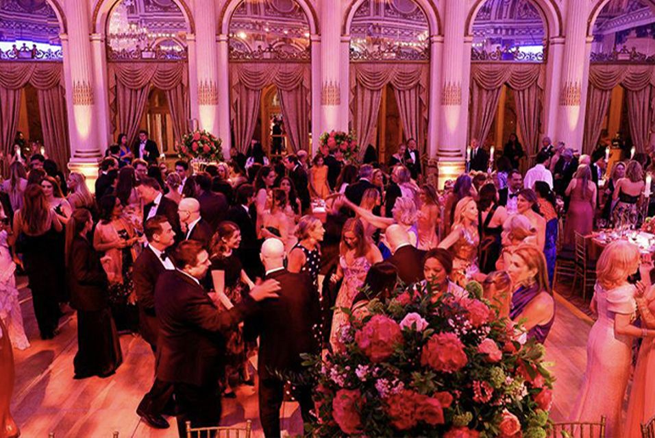 Attendees talk and dance at The Society of MSK Spring Ball. 