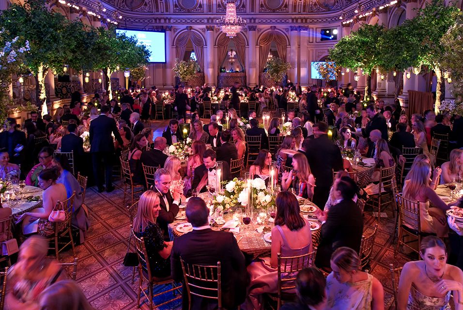 2025 Spring Ball attendees seated at tables.